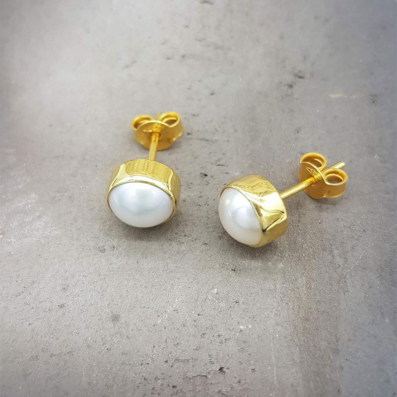Womens handmade earrings made of K18 gold decorated with white natural pearls 8mm