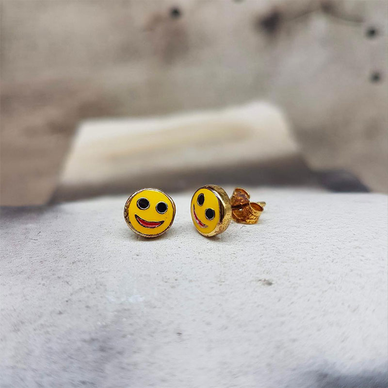 Childrens silver earrings 925 ° in the shape of an emoticon with enamel.