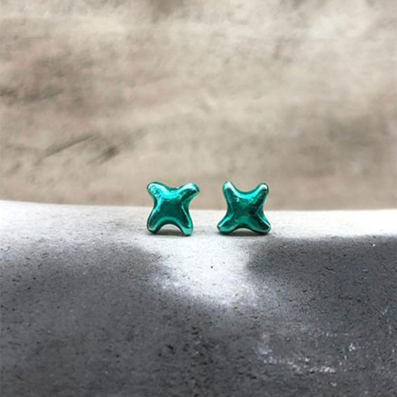 Childrens handmade 925 ° silver earrings in star shape decorated with blue-green enamel.