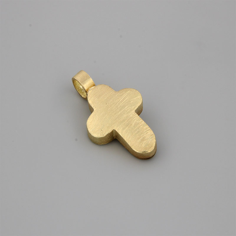 Womens handmade cross from yellow gold K14 with special diamond treatment.