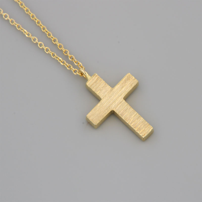 Womens handmade small cross made of yellow gold with K14 chain and special engraving processing.