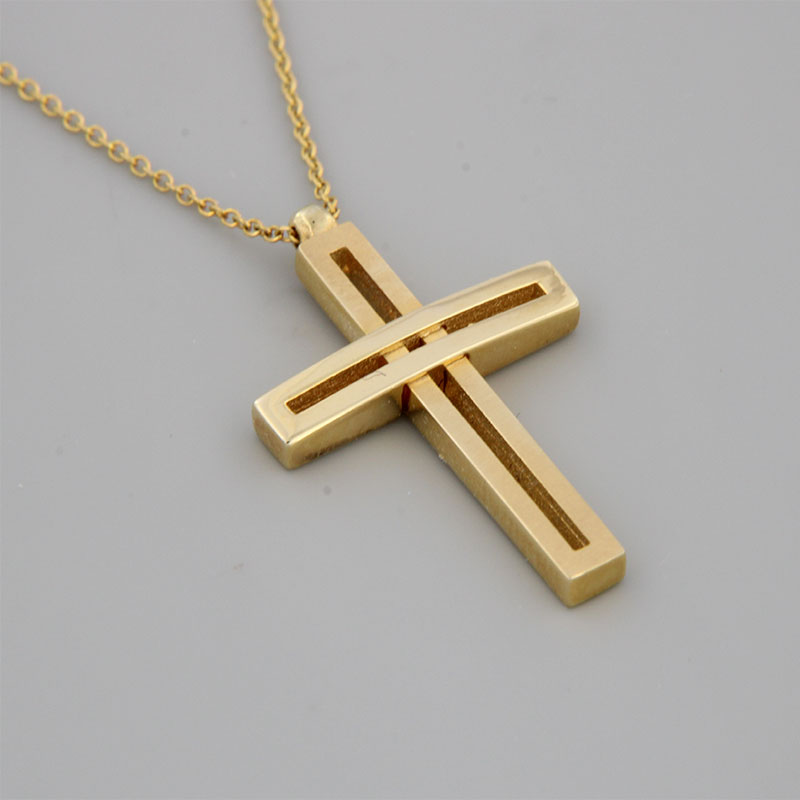 Womens handmade cross made of yellow gold with K14 chain decorated with matte and polished surfaces.