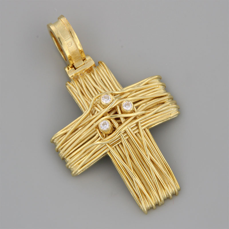 Womens handmade cross made of yellow gold with knitted wires K14 decorated with white zircons.