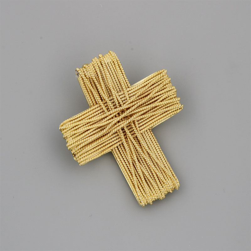 Womens handmade cross from yellow gold K14 with braided twisted wires harmoniously with each other.