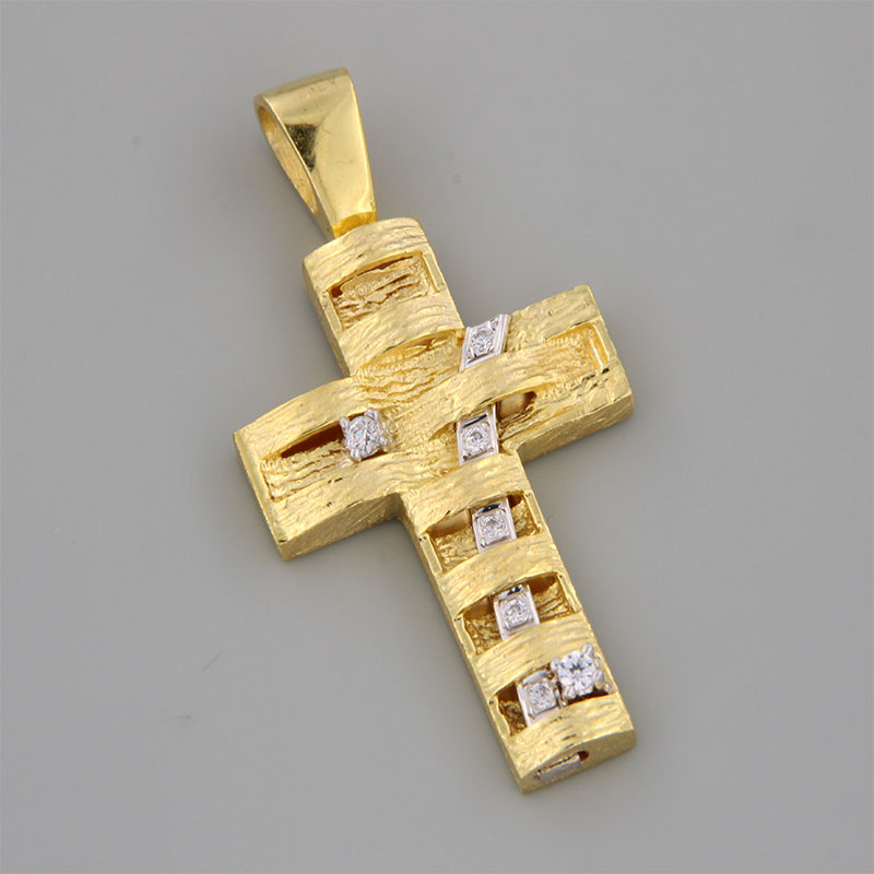 Womens handmade cross made of yellow gold K14 with special engraving processing of white platinum and white zircons.