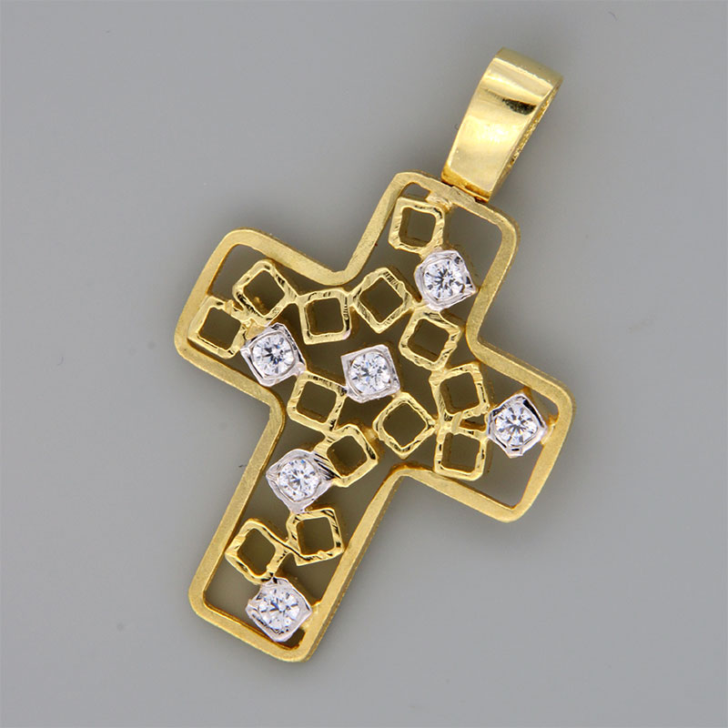 Womens handmade cross made of yellow gold K14 with white platinum details decorated with white zircons.