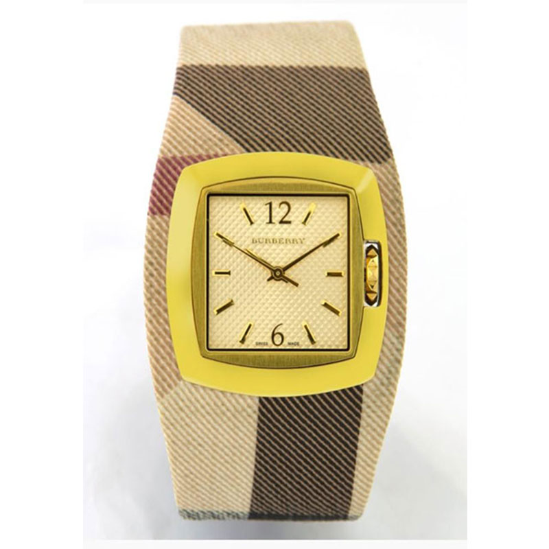 BURBERRY womens watch made of gold stainless steel with silk strap and BU4051 safety clasp.