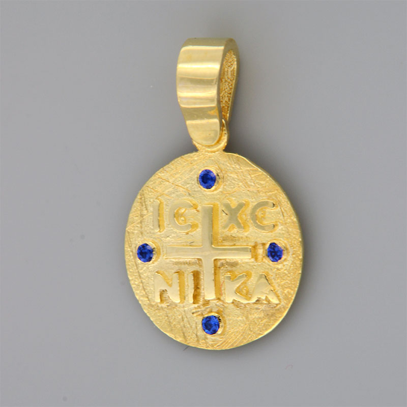 Handmade Constantine double sided from K9 gold and blue sapphires.