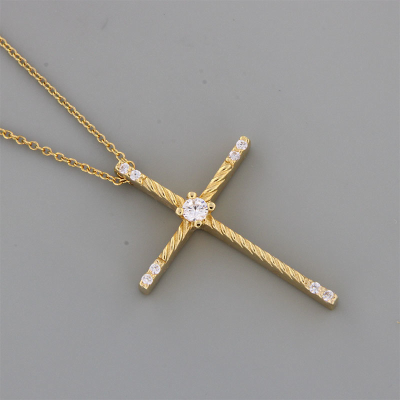 Womens handmade cross made of yellow gold with K14 chain decorated with white zircons.
