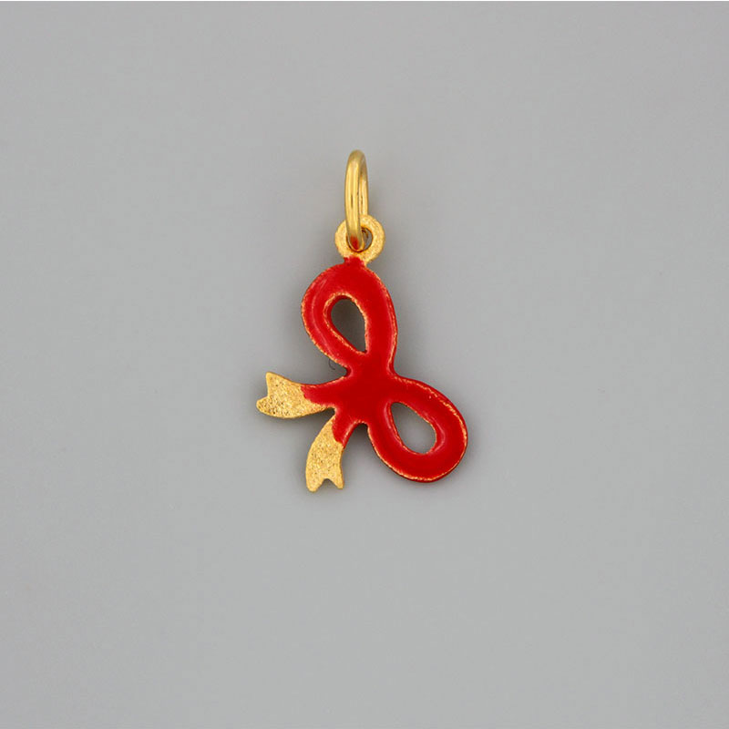 Childrens gold handmade pendant Bow with special sandblasting treatment and red enamel K14.