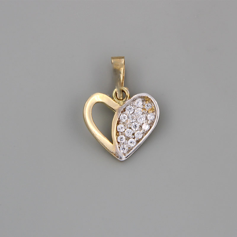 Childrens gold pendant in the shape of Heart with polished surface decorated with white zircons K14.