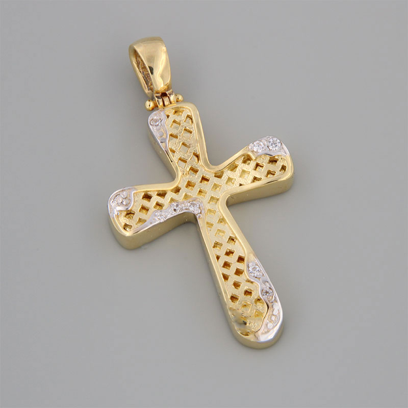 Handmade baptismal cross for girl in yellow and white gold K14 with special diamond treatment and white zircons.