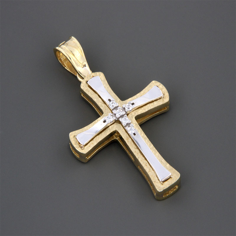 Handmade two-tone baptismal gold Cross K14 on a polished surface decorated with white zircons from the Valoro workshop.