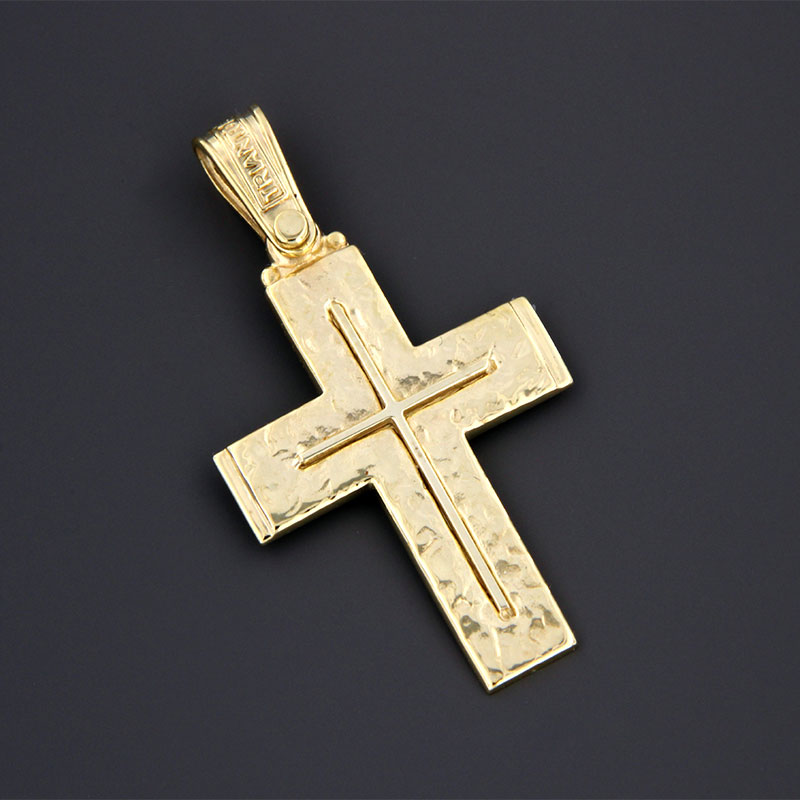 Mens handmade gold Cross K14 on a polished surface with a special forging treatment from the TRIANTOS workshop.