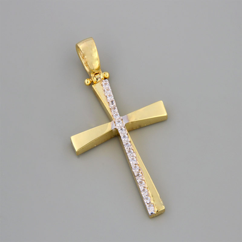 Childrens golden baptismal cross K14 on a polished surface with white details and white zircons from the Eos workshop.