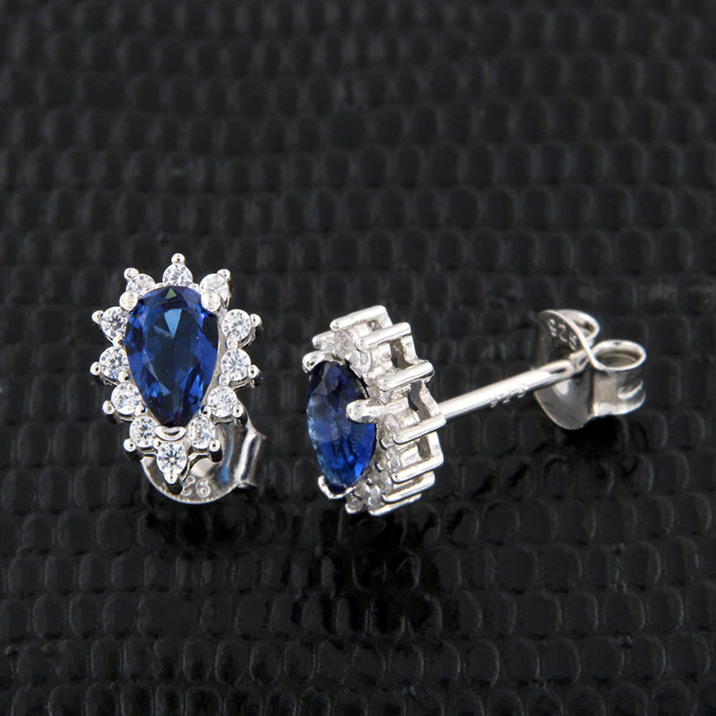 Womens studded earrings Rosette teardrop 925 decorated with blue and white zircons.