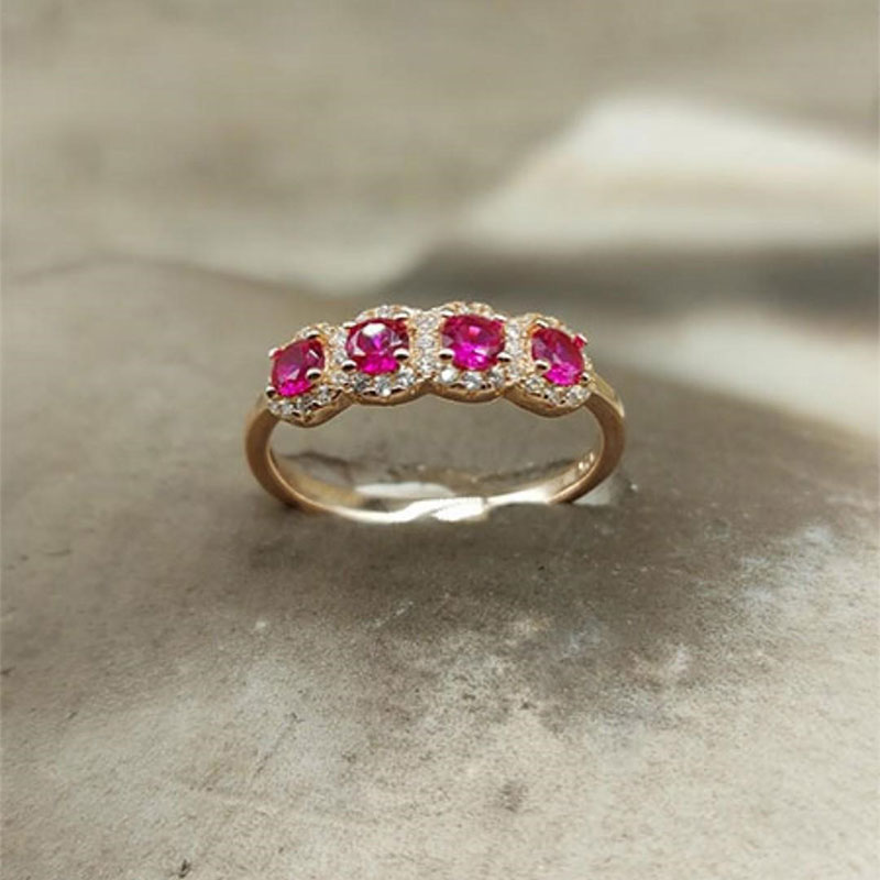Γυναικείο ασημένιο επίχρυσο ροζ Σειρέ δακτυλίδι 925° διακοσμημένο με κόκκινα και λευκά ζιργκόν. 