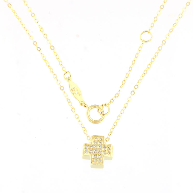 Womens small cross made of yellow gold with 9K chain decorated with white zircons.