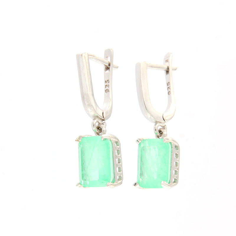 Womens silver earrings with hanging 925 decorated with natural emeralds.