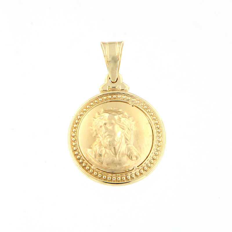 14 karat gold pendant with the figure of Christ and the Virgin Mary.