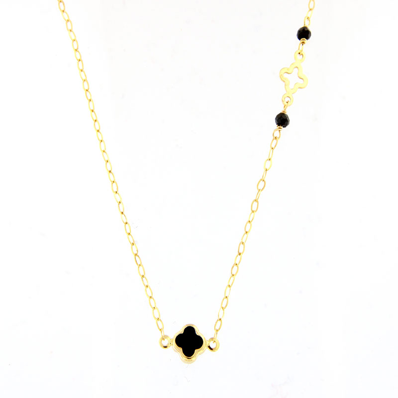 Womens gold necklace with two K9 crosses decorated with black onyx.